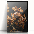 Large abstract wall art depicting autumnal trees in warm orange and red tones, framed in black acrylic.