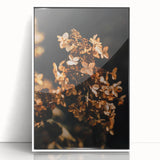 Art deco poster of a stylized fall scene with orange and brown hues on a white acrylic framed canvas.