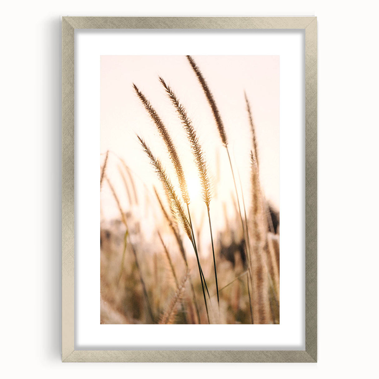 Textured art print featuring abstract swirls in muted gray and silver tones, framed in silver, ideal for bedroom art.