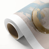 Abstract geometric rolled canvas artwork showcasing vibrant blue, orange, and yellow shapes on a textured surface, ideal for modern home decor and artistic expression.