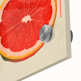 Close-up of large abstract fruit-themed acrylic glass wall art in vibrant colors, ideal for dining room decor.