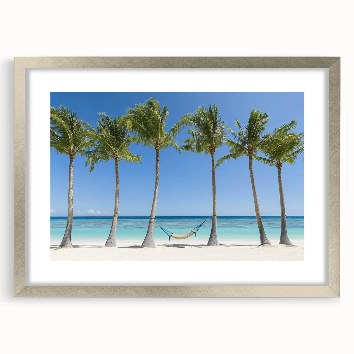 Framed landscape artwork depicting serene beaches with a silver mat, showcasing vibrant colors and details, perfect for enhancing home decor.