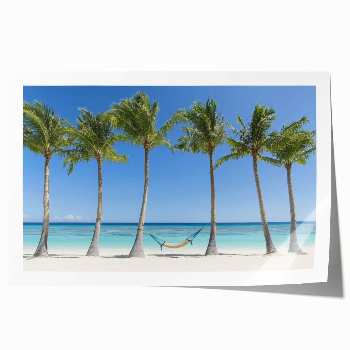 Vibrant rolled print showcasing a serene beach landscape with soft waves and a clear blue sky, ideal for coastal decor enthusiasts, packaged in a protective tube.