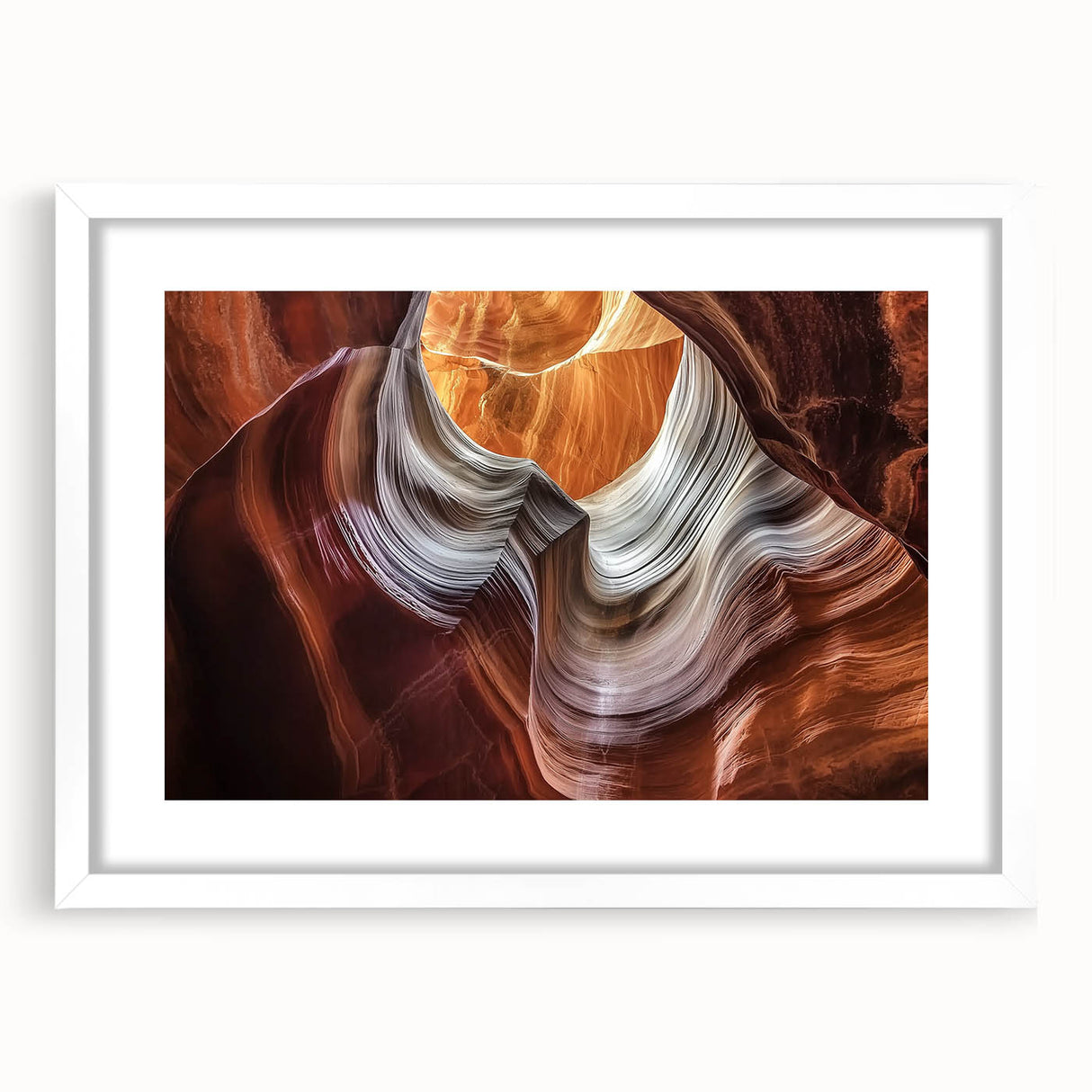 Landscape art print of canyons framed in a white mat, showcasing vibrant earth tones and intricate details, ideal for home decor enthusiasts seeking natural beauty.