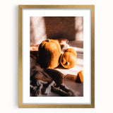 Extra large abstract art print depicting textured autumnal hues on a gold-framed canvas, ideal for living room decor.