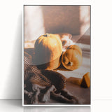 Art deco poster featuring a stylized autumn scene in orange and brown tones, framed in white acrylic.