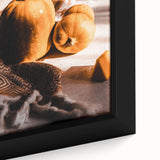 Close-up of extra large black wall art featuring textured, colorful autumn leaves on framed canvas.