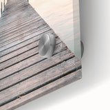 Large abstract wall art in vibrant orange and blue tones on acrylic glass, ideal for dining room ambiance.