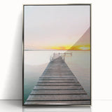 Mid-century modernist art featuring geometric shapes in pastel colors on a silver-framed acrylic print.