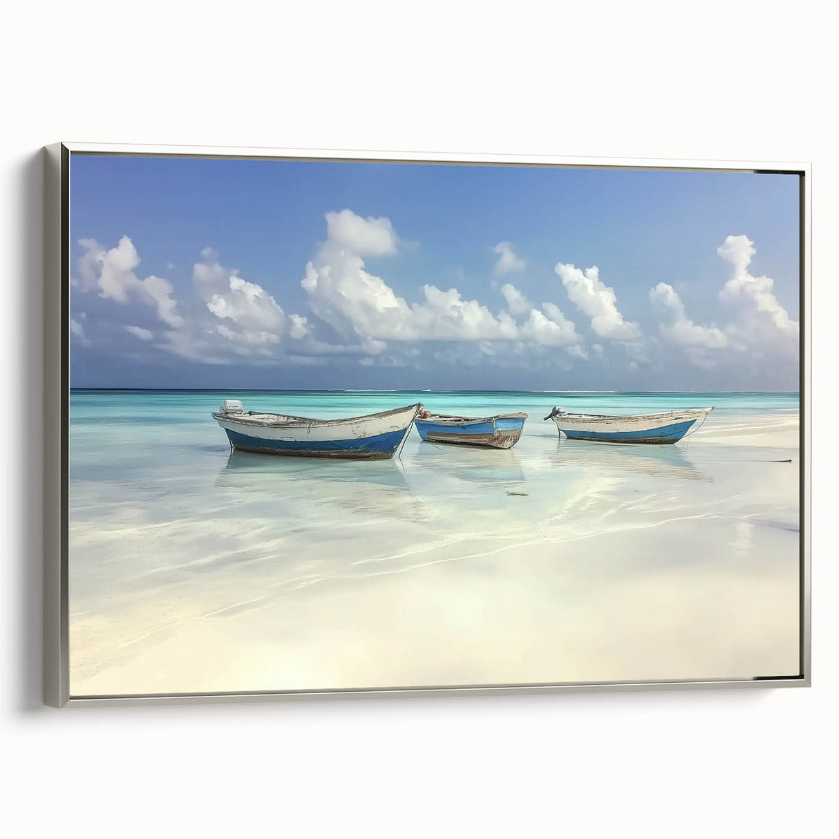 Framed landscape canvas artwork depicting serene beaches, showcasing silver frame accents and a vibrant color palette, perfect for enhancing coastal-themed decor.