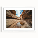 Framed landscape artwork depicting majestic canyons with a white mat, showcasing vibrant colors and intricate details, perfect for home decor enhancement.