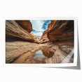 Vibrant landscape print showcasing expansive canyons under a clear blue sky, rolled for easy shipping, perfect for home decor or art enthusiasts.