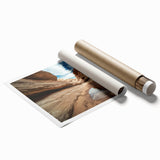 Landscape print showcasing vibrant canyons in rich earth tones, rolled for easy handling and display, ideal for enhancing home decor and art collections.