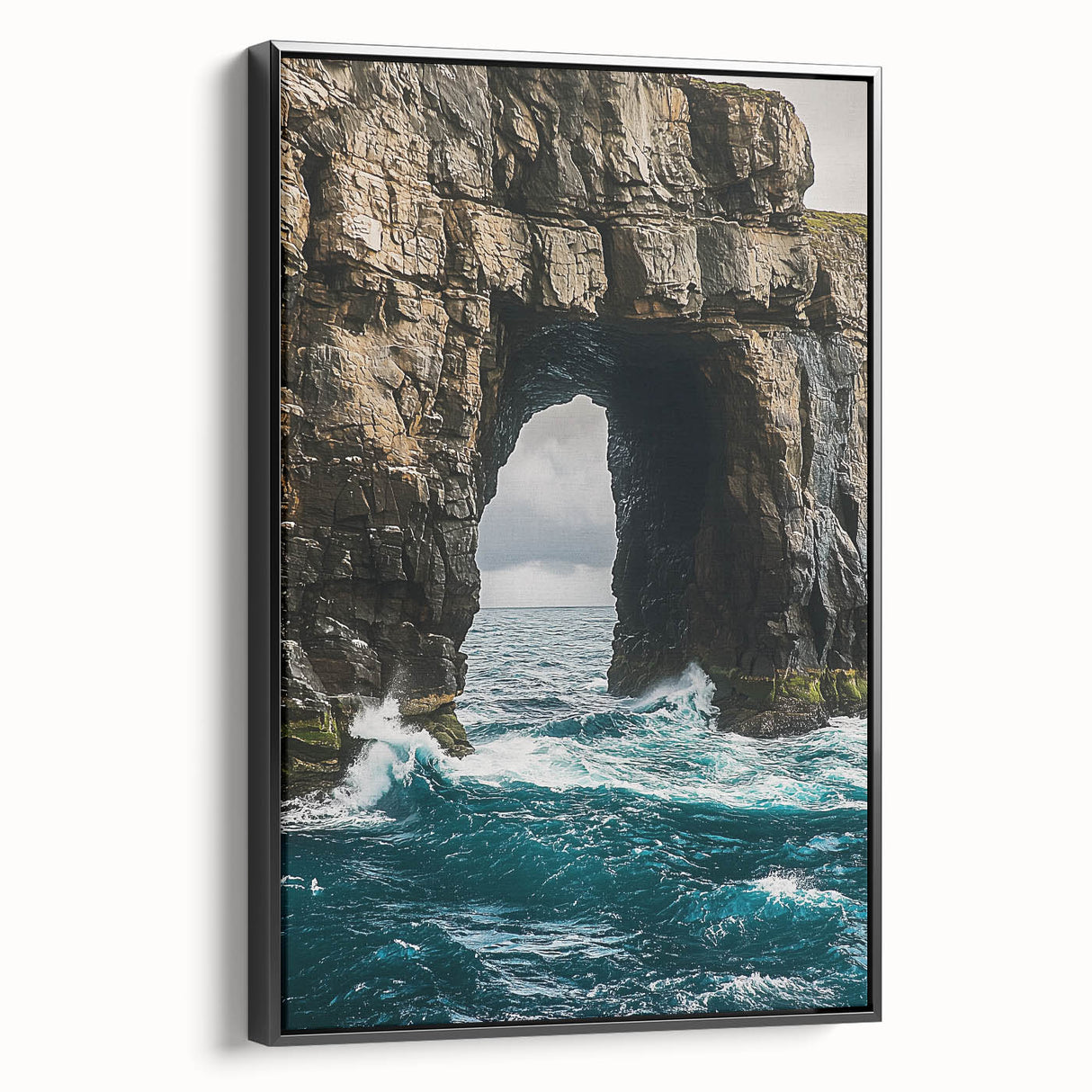 Framed canvas artwork depicting a serene landscape with majestic cliffs, featuring a sleek black frame and showcasing vibrant colors that enhance any decor style.