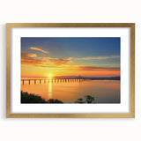 Gold landscape bridge frame with a white mat, showcasing a scenic view, perfect for elegant home decor. Ideal for art lovers looking to enhance their interior design.