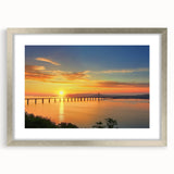 Silver landscape bridge frame with a white mat, showcasing a scenic view, perfect for adding elegance to home decor or gallery displays. The frame's sleek design enhances the artwork's visual appeal.