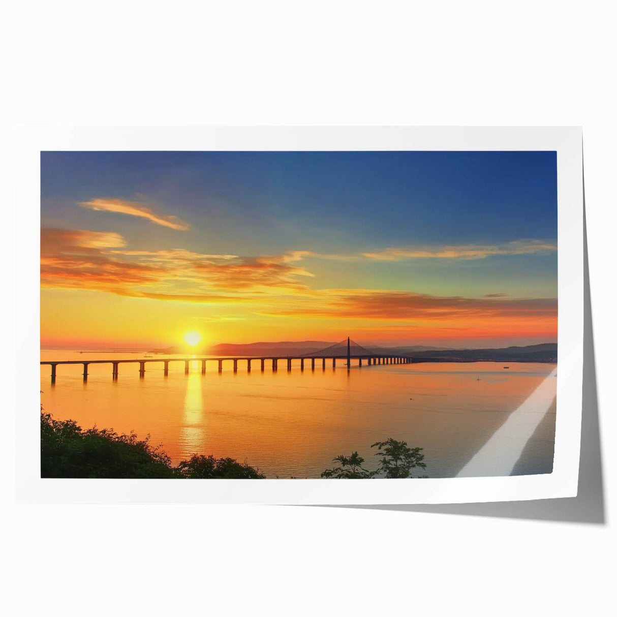 Rolled print of a landscape bridge artwork showcasing vibrant colors and intricate details, securely packaged in a durable cardboard tube for safe shipping.