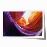 Vibrant landscape print showcasing majestic canyons in rich earth tones, rolled for easy transport, perfect for home decor or art collectors.