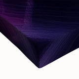 Close-up of a stretched canvas showcasing a vibrant landscape of canyons with rich earthy tones, ideal for home decor or art collectors seeking nature-inspired artwork.