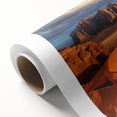 Vibrant rolled canvas artwork depicting a majestic cliff landscape, showcasing rich colors and intricate details, ideal for home decor and enhancing interiors.