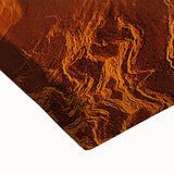 Close-up of a stretched canvas artwork depicting dramatic cliffs and vibrant landscapes, showcasing intricate textures and natural colors, perfect for home decor.