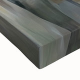 Close-up of a vibrant abstract figurative stretched canvas artwork showcasing bold colors and intricate patterns, perfect for modern home decor or artistic display.