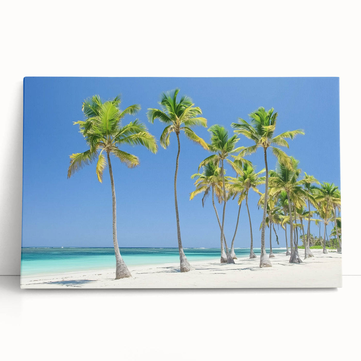 Stretched canvas artwork depicting a serene beach landscape with soft pastel colors, ideal for home decor and creating a calming atmosphere in living spaces.