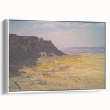 Framed landscape canvas print showcasing vibrant canyons in rich earth tones, elegantly displayed with a white frame, perfect for enhancing home décor.