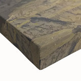 Close-up of a stretched canvas artwork depicting a vibrant landscape of canyons, showcasing intricate details and rich colors, perfect for home decor in nature-inspired settings.