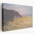 Stretched canvas artwork depicting a stunning landscape of canyons in warm earth tones, perfect for adding a touch of nature-inspired elegance to any room.