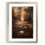 Textured abstract art print depicting autumnal hues on a framed silver canvas, suitable for bedroom decor.