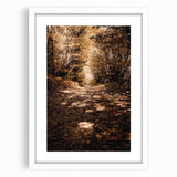 Abstract art print featuring warm autumnal hues on a white framed canvas, ideal for dining room decor.