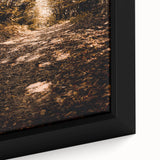 Close-up of extra large framed canvas featuring black textured art with colorful abstract shapes.