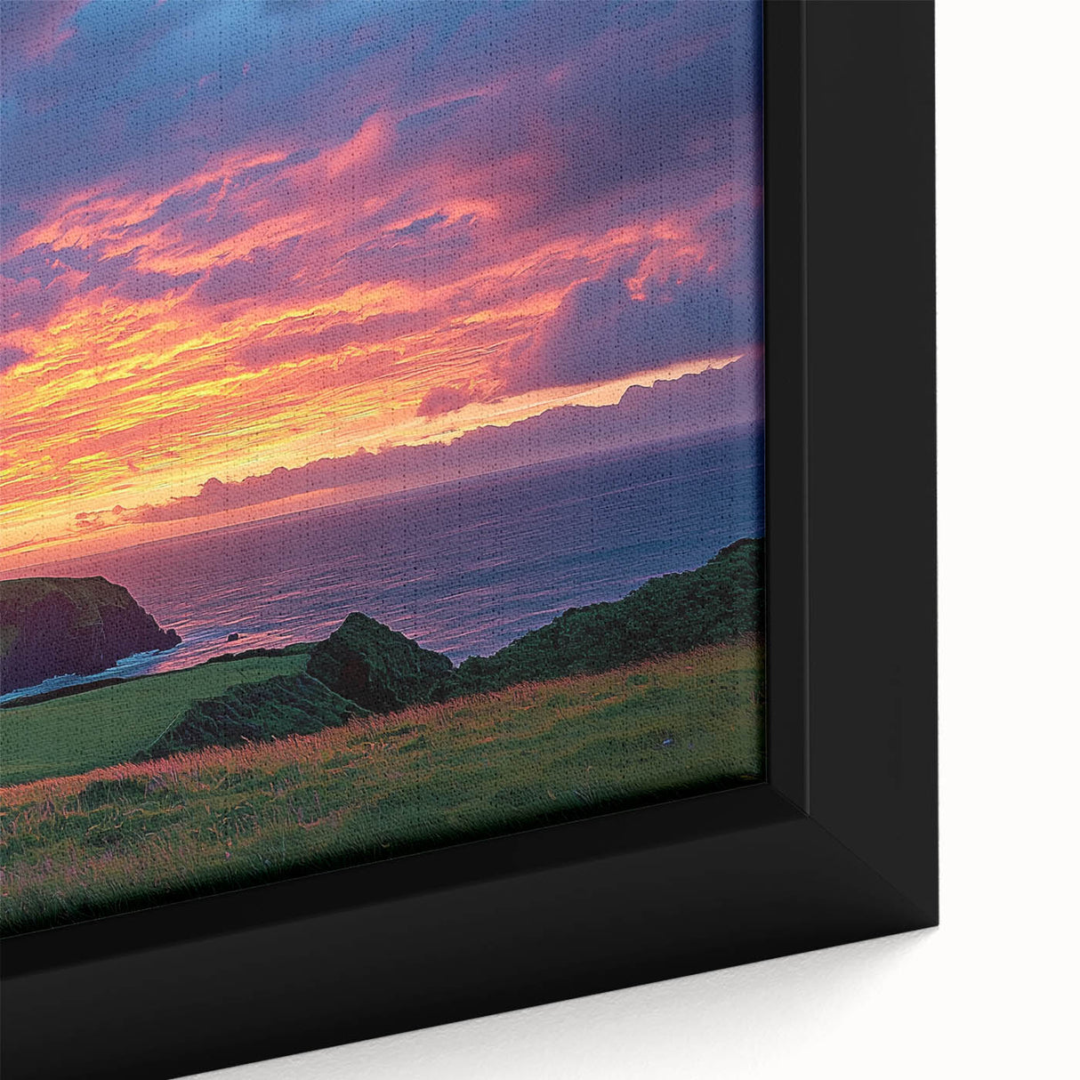 Close-up of a framed canvas depicting a breathtaking landscape of rugged cliffs under a vibrant sunset, showcasing intricate details and rich colors. Ideal for enhancing home decor and adding a touch of nature-inspired art.