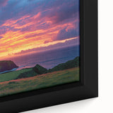 Close-up of a framed canvas depicting a breathtaking landscape of rugged cliffs under a vibrant sunset, showcasing intricate details and rich colors. Ideal for enhancing home decor and adding a touch of nature-inspired art.