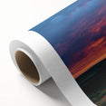 Stunning rolled canvas artwork depicting a dramatic cliff landscape under a vibrant sunset, showcasing rich colors and intricate details, perfect for home decor.