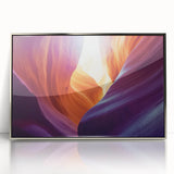 Framed acrylic artwork depicting a stunning landscape of colorful canyons, showcasing vibrant hues of orange, red, and blue, perfect for modern home decor.