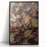 Large abstract wall art featuring autumnal shades on acrylic, framed in black, suitable for modern living room decor.