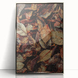 Mid-century modernist art depicting autumn trees in muted orange and brown tones, framed in silver acrylic.