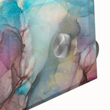 Abstract acrylic art print showcasing vibrant splatters of blue, orange, and yellow on clear glass, emphasizing texture and color depth for modern decor.