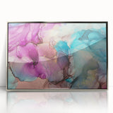 Framed acrylic artwork showcasing abstract silver and black splatters on a white background, adding a modern touch to home decor with a sleek finish.