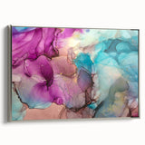 Framed canvas artwork showcasing abstract splatters in vibrant colors, with a sleek silver frame, ideal for modern home decor and artistic interiors.