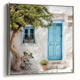 Framed canvas featuring a vintage poster of a Greek door architecture in black with colorful art accents.