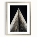 Textured abstract art print in cool gray tones on a framed canvas, ideal for modern bedroom ambiance.