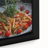 Close-up of a framed canvas featuring black wall art with colorful, textured abstract dishes, ideal for living room decor.