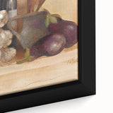 Close-up of black wall art featuring textured, colorful food and drinks imagery on a framed canvas.