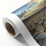 Rolled canvas showcasing vibrant African tribal art with intricate patterns, featuring a textured finish. Packaged securely in a durable tube for safe transport.