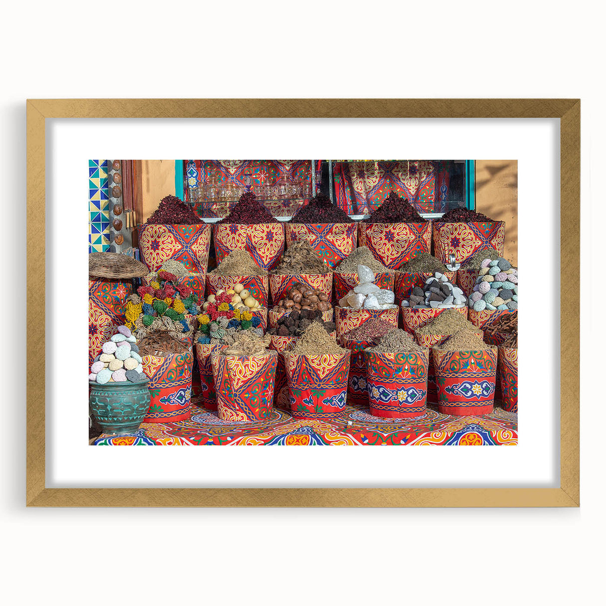 Textured art print of abstract Egyptian scenery in gold and earth tones on a framed canvas, suitable for bedroom decor.