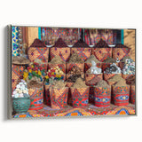 Vintage poster art of an Egyptian scenery on a framed canvas, featuring vibrant colorful art and black accents.