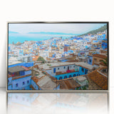 Acrylic print of a Moroccan landscape in earthy tones, framed in silver, suitable for modern art wall decor.